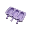 Purple silicone mold with bunny shapes on a white background