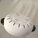 White helmet with black accents on a light gray background