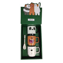 Set of mugs with cartoon character design in a green box on a white background