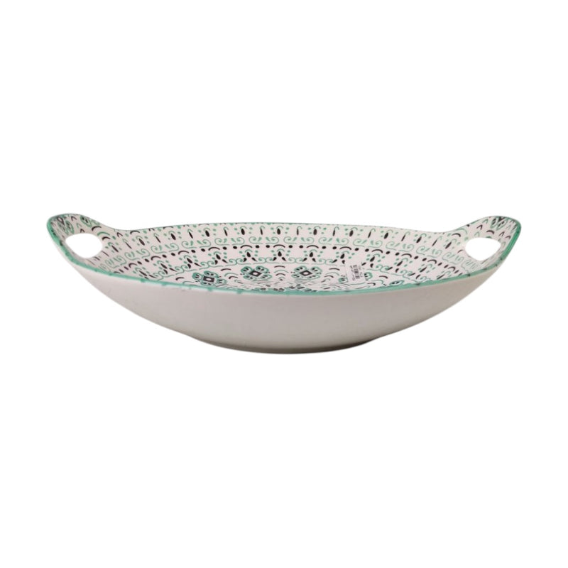 Decorative ceramic bowl with handles on a white background