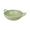 Green ceramic bowl with handles on a white background