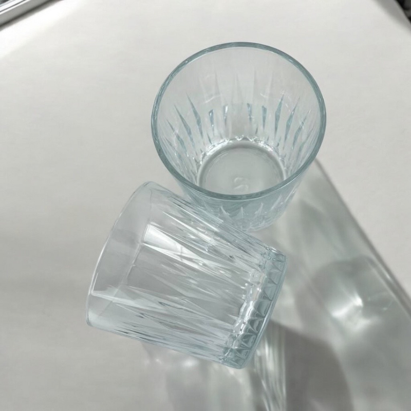Two Pasabahce Luzia 300ml Glass Tumblers With Geometric Cut Design On Bright Surface