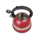 Red speckled kettle with a black handle on a white background