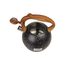 Black speckled teapot with wooden handle on a white background
