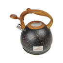 Black speckled kettle with wooden handle on a white background