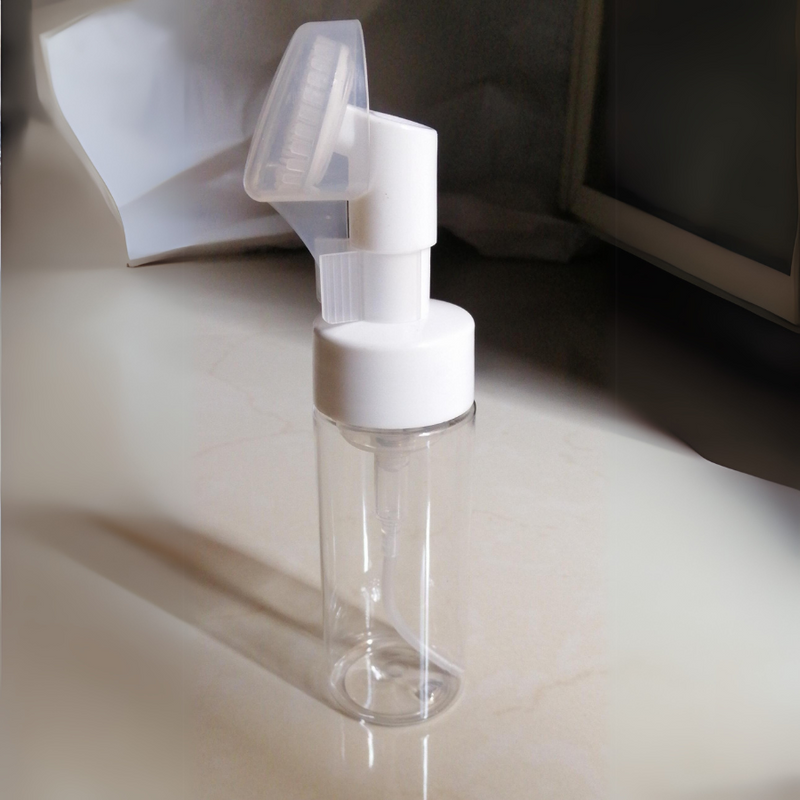 Foaming Soap Dispenser With Protective Silicone Brush Cover – Transparent Bottle Standing on Surface – Cupindy