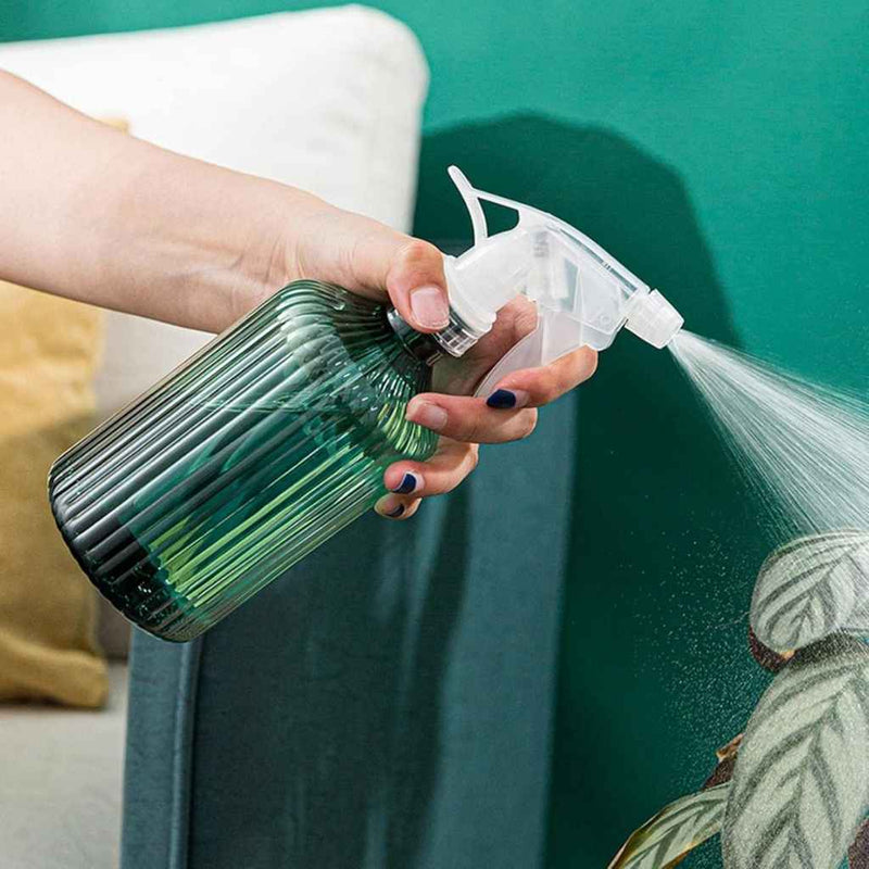 Refillable plastic spray bottle for plants and cleaning
