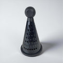 Black cone-shaped kitchen tool on a white background