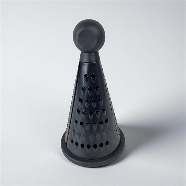 Black cone-shaped kitchen tool on a white background