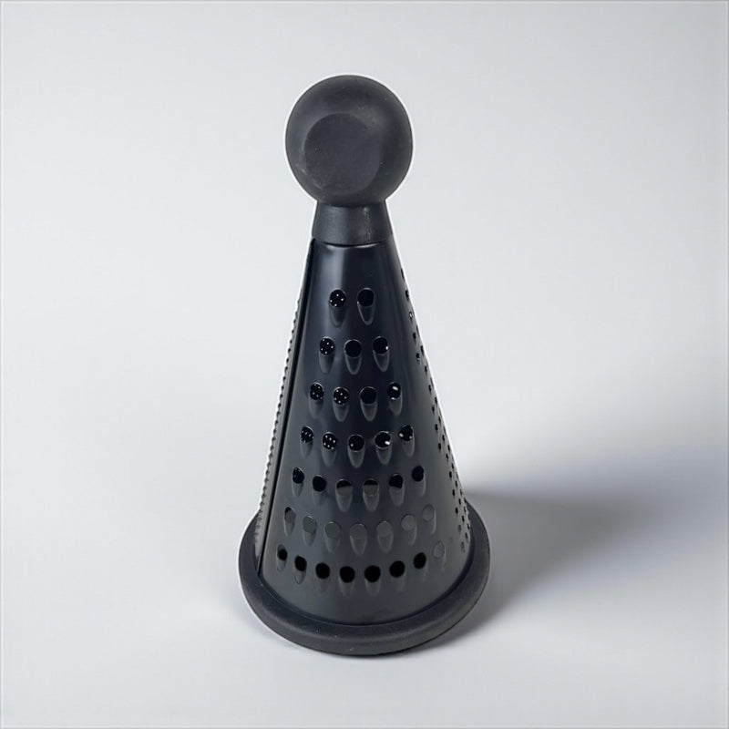 Black cone-shaped kitchen tool on a white background
