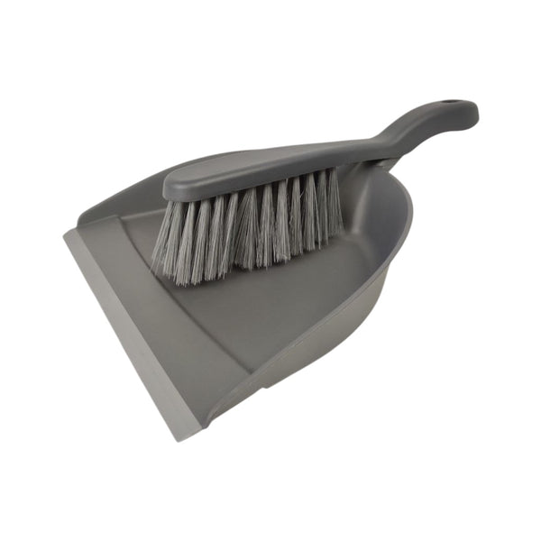 Gray dustpan and brush set on a white background
