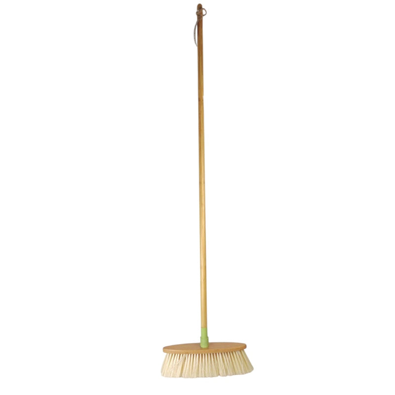 Broom with a wooden handle on a white background