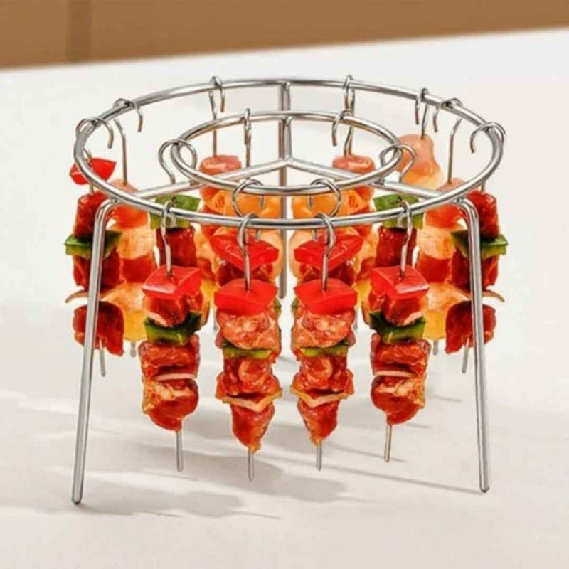 Metal skewer holder with skewers of food on a white background