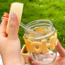Trendy glass drinking cup with straw, soft grip, and cute look