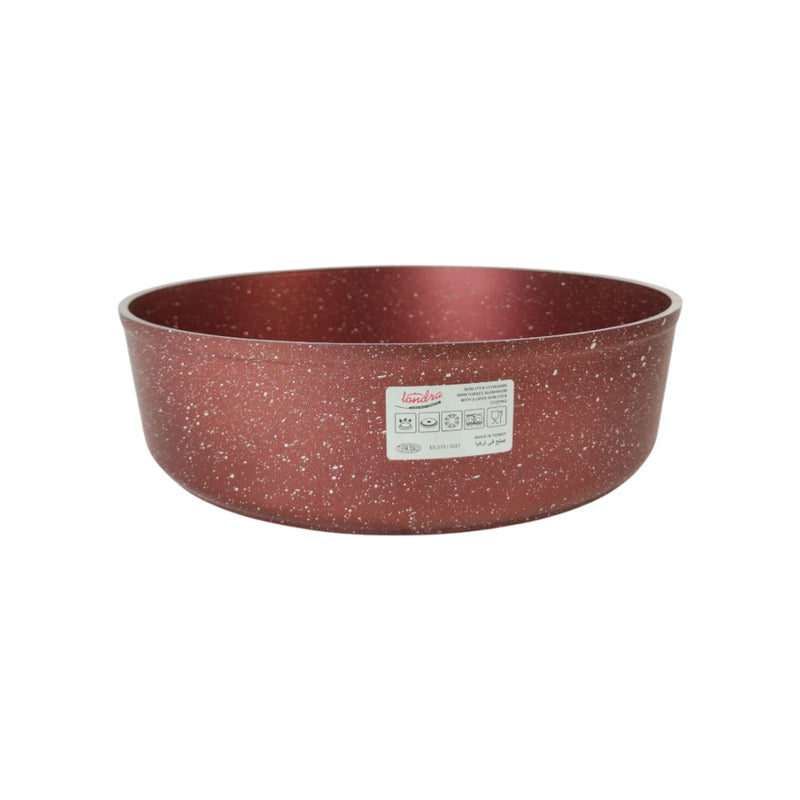 Red speckled bowl with a label on a white background