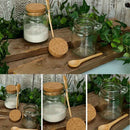Small airtight glass jar with cork lid for spices and sauces