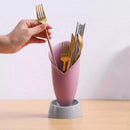 Multi-functional standing holder for snacks, forks, and kitchen tools.