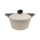 Ceramic pot with a black lid on a white background