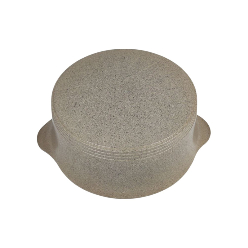 Round stone-like object on a white background
