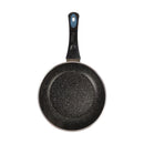 Black speckled frying pan with a blue handle on a white background