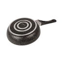 Black speckled frying pan with a handle on a white background