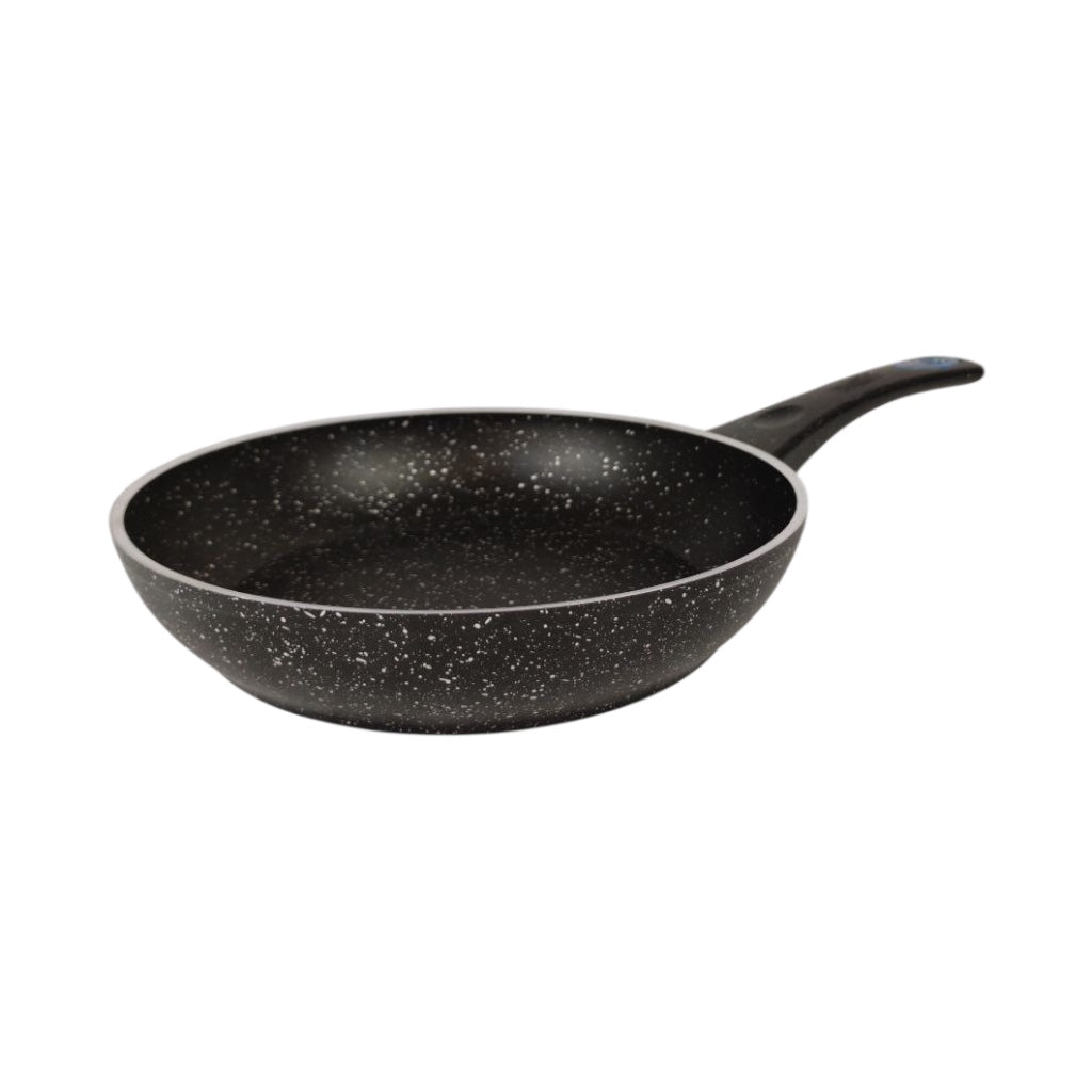 Black speckled frying pan on a white background