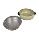 Two grill components on a white background, one metallic and one beige.