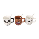 Three mugs with cartoon faces on a white background