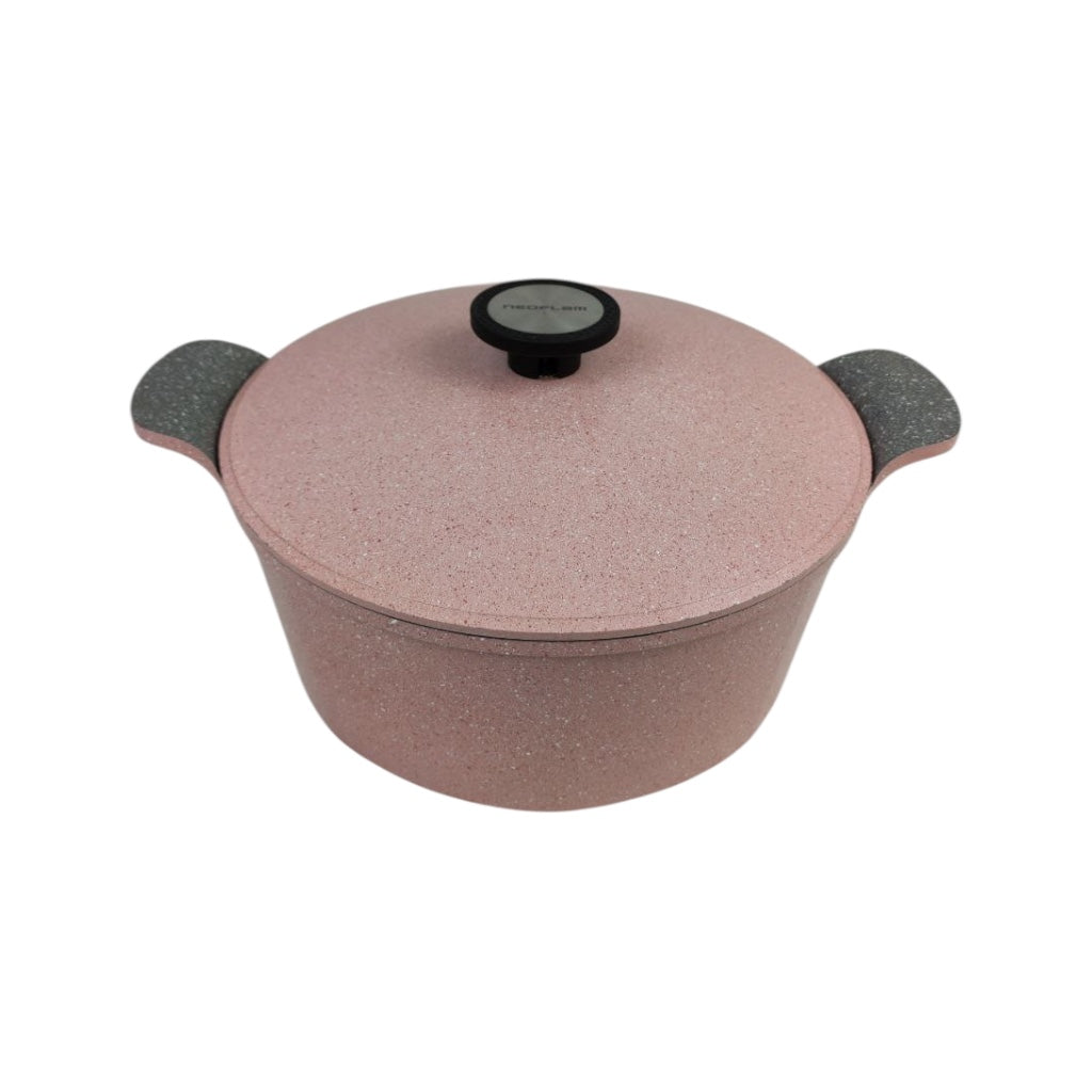 Pink speckled cookware pot with black handles and lid on a white background
