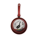 Red frying pan with a visible brand label on a white background