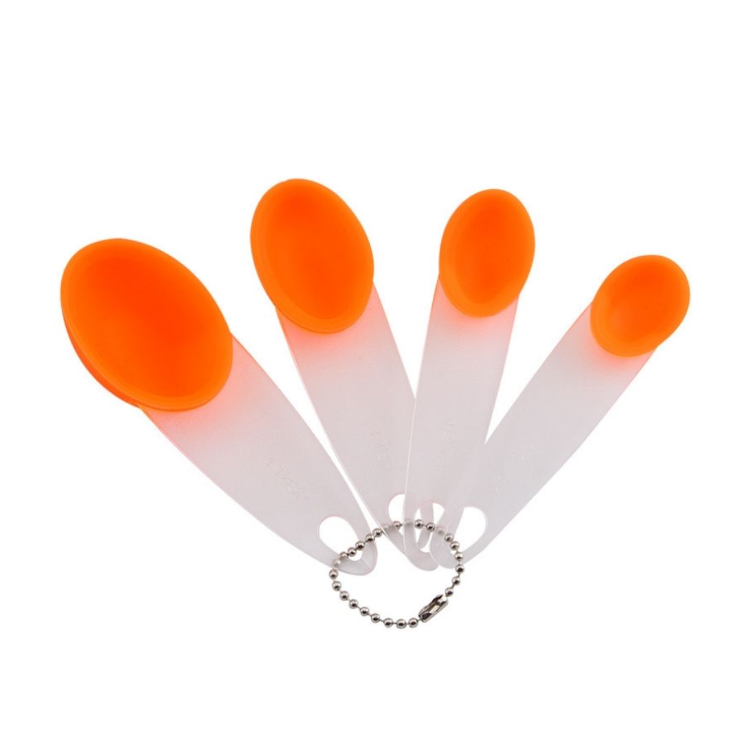 Kitchen measuring spoons in bright colors, ideal for cooking and desserts | Cupindy