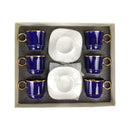 Set of six blue ceramic cups with gold handles and two white ceramic plates in a box.