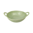Green ceramic bowl with handles on a white background