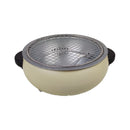 Beige colander with metal mesh on a white background