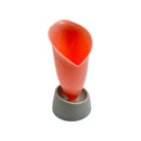 Red-orange plastic kitchen funnel with angled spout and grey silicone base, upright design on white background