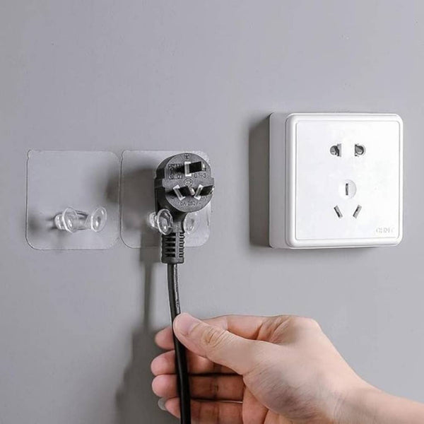 Self-Adhesive Wall Plug Holder – Transparent, No-Drill Cable Organizer Hook – 1 Piece