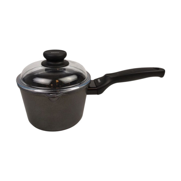 Black saucepan with a lid on a white background