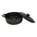 Black cast iron pot with lid on a white background