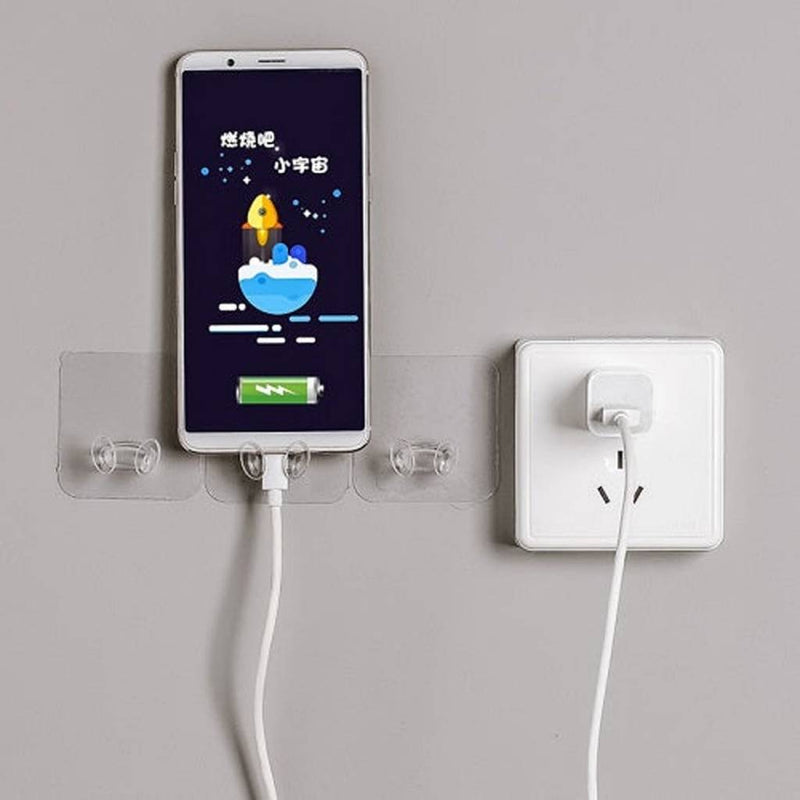 Transparent stick-on wall holder for cable and plug storage without drilling | Cupindy