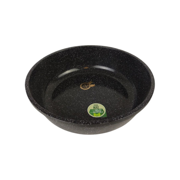 Black speckled frying pan with a green label on a white background