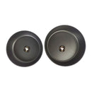 Two black frying pans on a white background