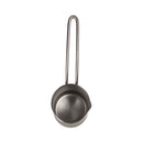 Metallic ladle with a handle on a white background