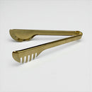 Gold tongs on a white background