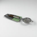 Metallic kitchen strainer with a handle on a white background