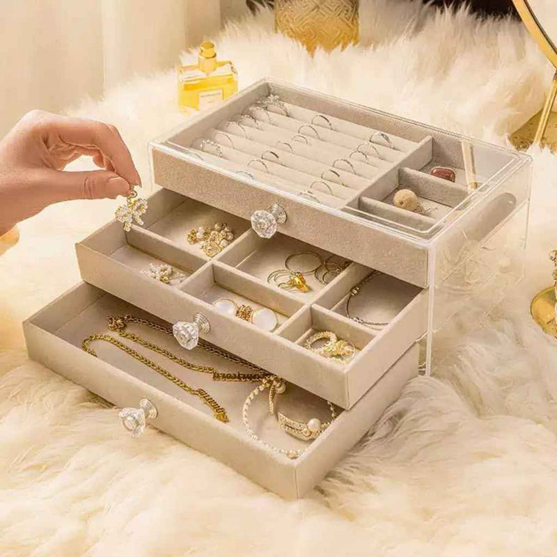 Jewelry display case with glass-like cover and crystal knobs