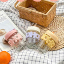 Reusable glass tumbler with straw and fun pastel silicone wrap