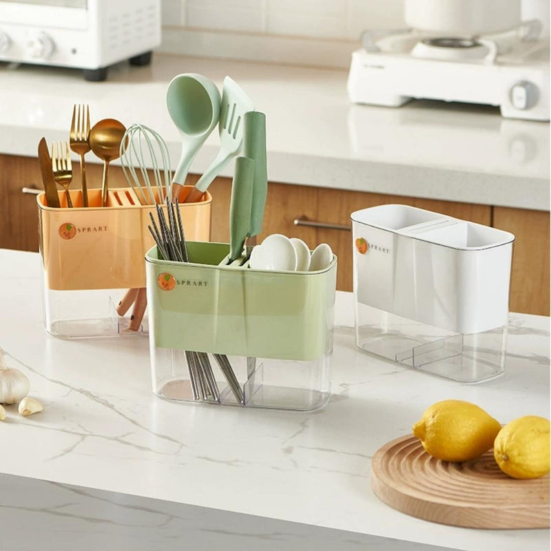 Kitchen utensil organizer with utensils on a kitchen counter