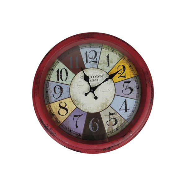 Round wall clock with a colorful face on a white background