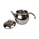 Silver teapot with gold accents on a white background