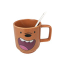 Brown mug with cartoon face design on a white background